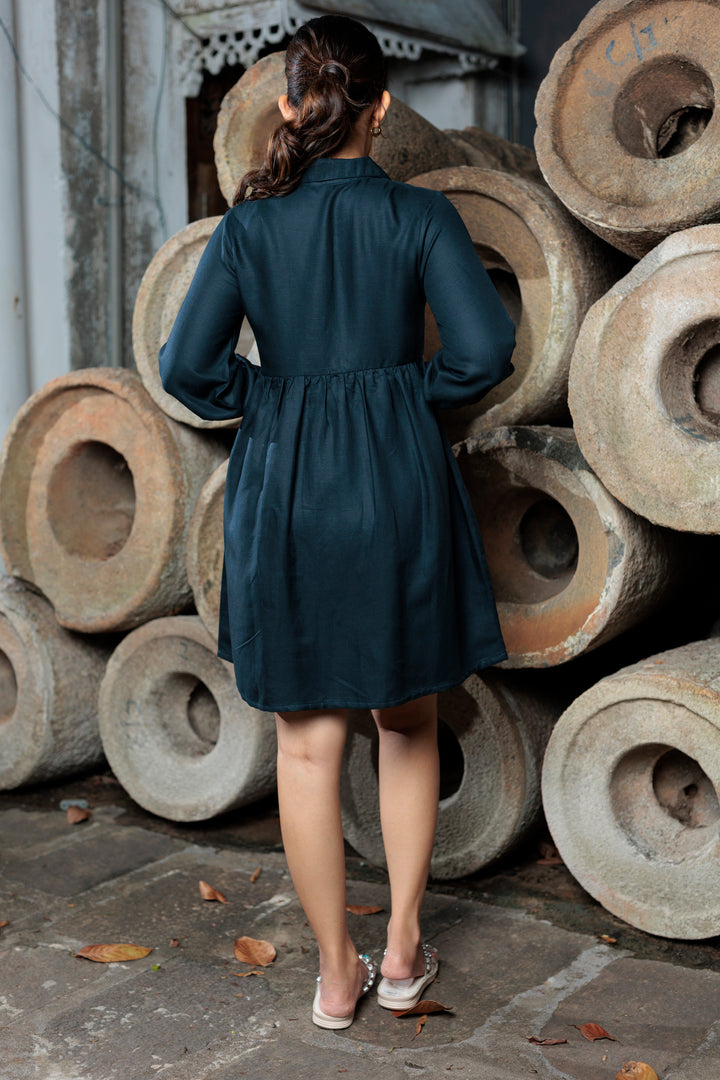 Women’s gathered above knee shirt dress, back view