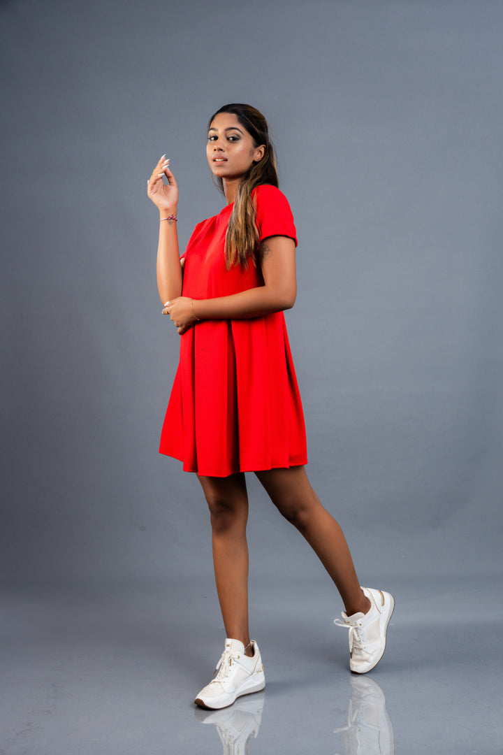 Women’s box pleat mini dress, front view