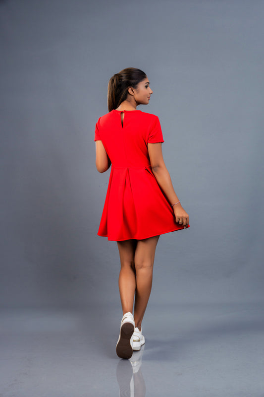 Women’s box pleat mini dress, back view