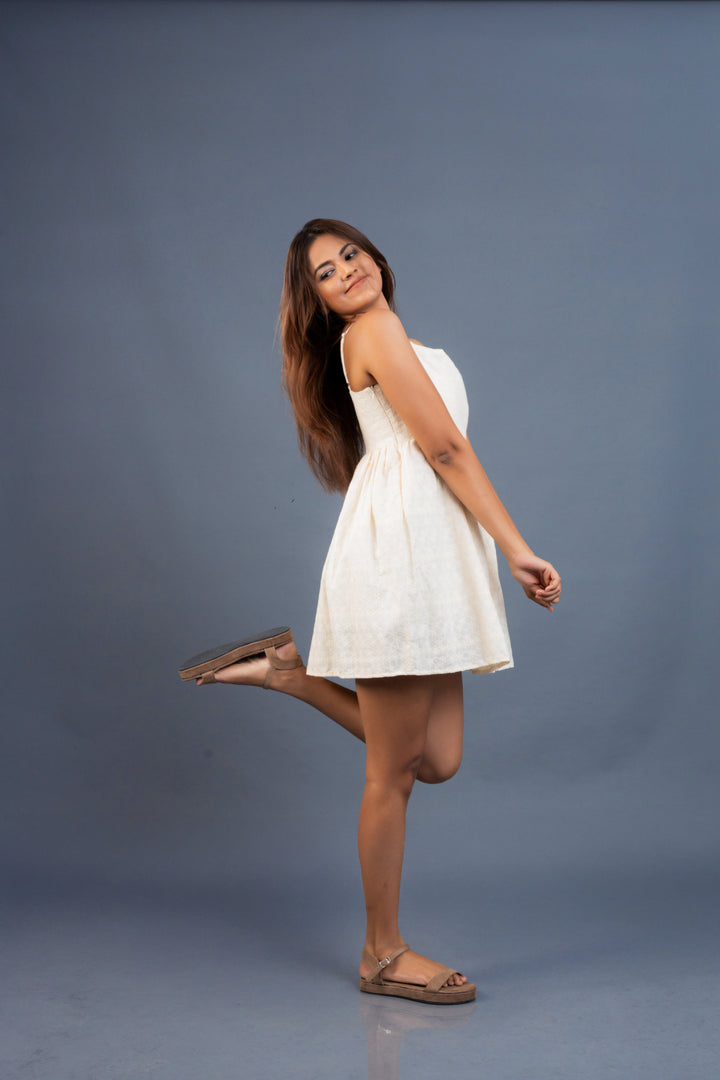 Women’s strapped detailed cutlawn mini dress, side view