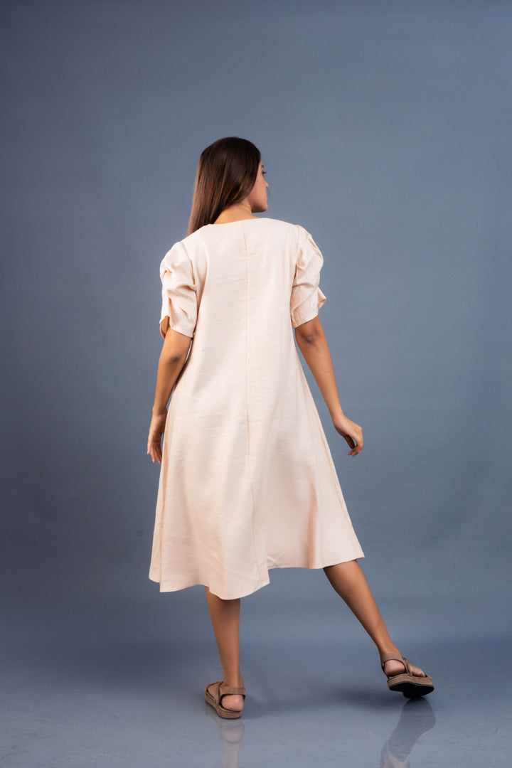 Women’s linen dress with gathered sleeve details, back view
