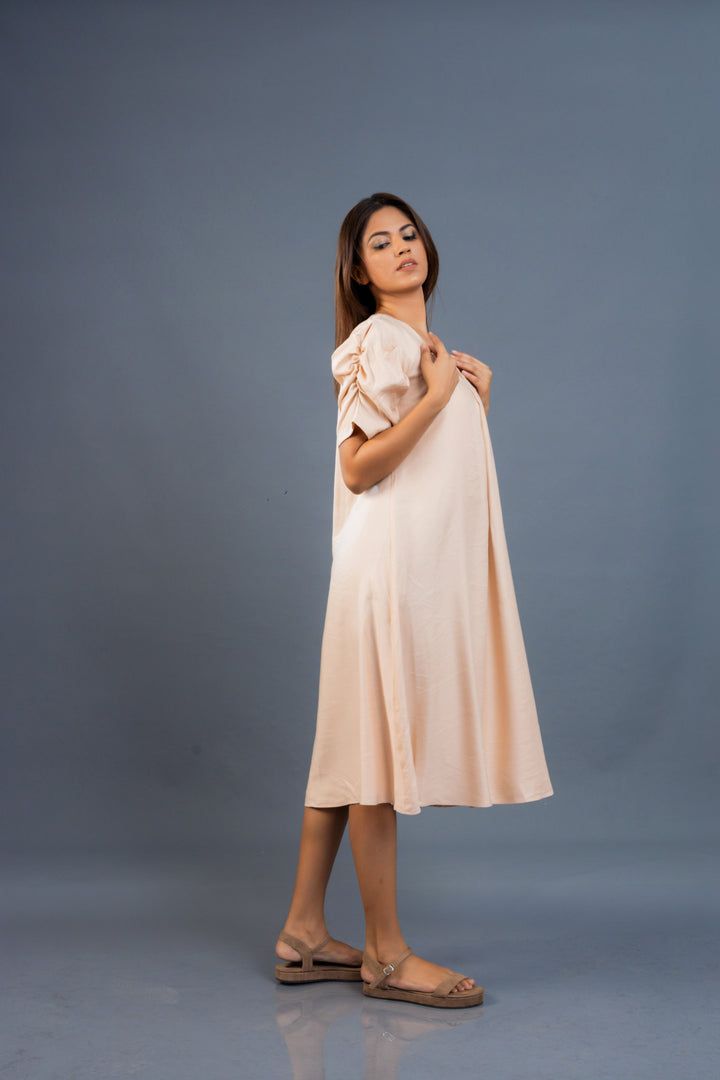 Women’s linen dress with gathered sleeve details, side view