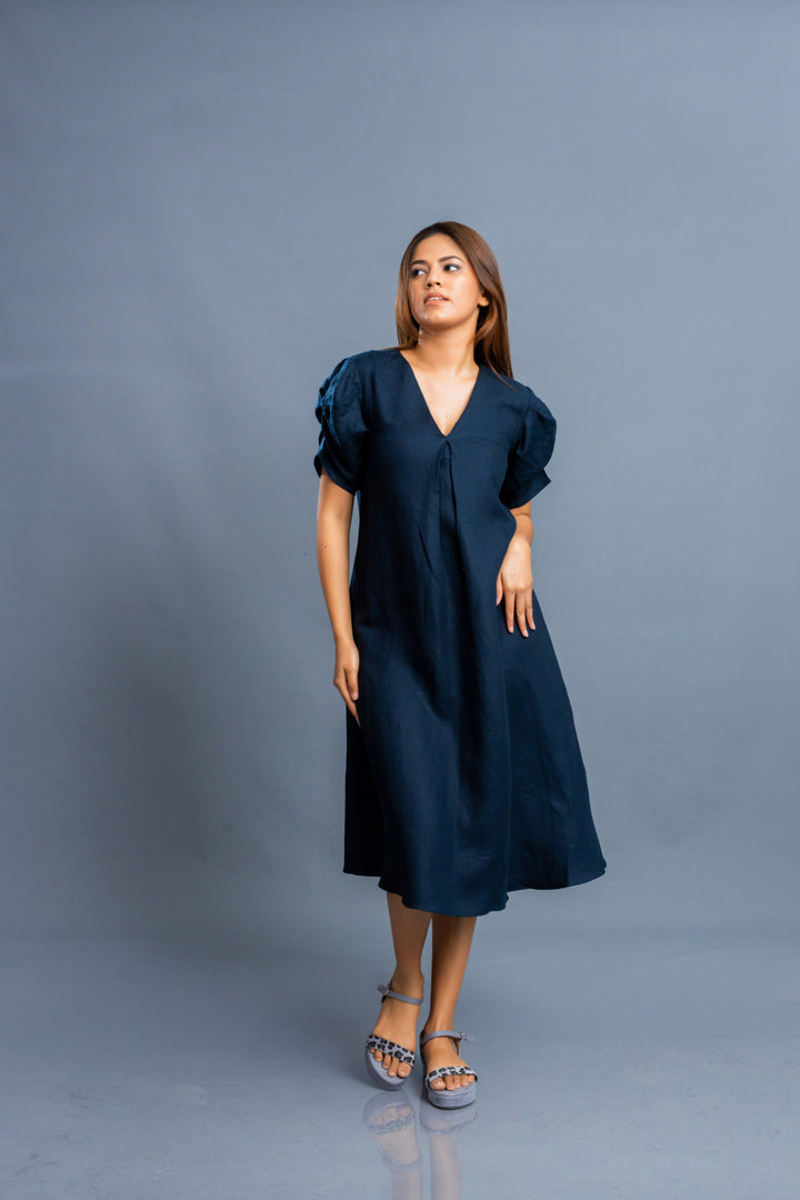 Women’s linen dress with gathered sleeve details, front view